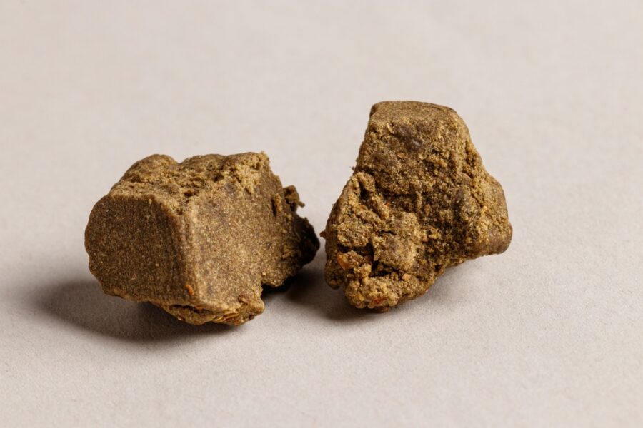 Two lumps of hash on a white background