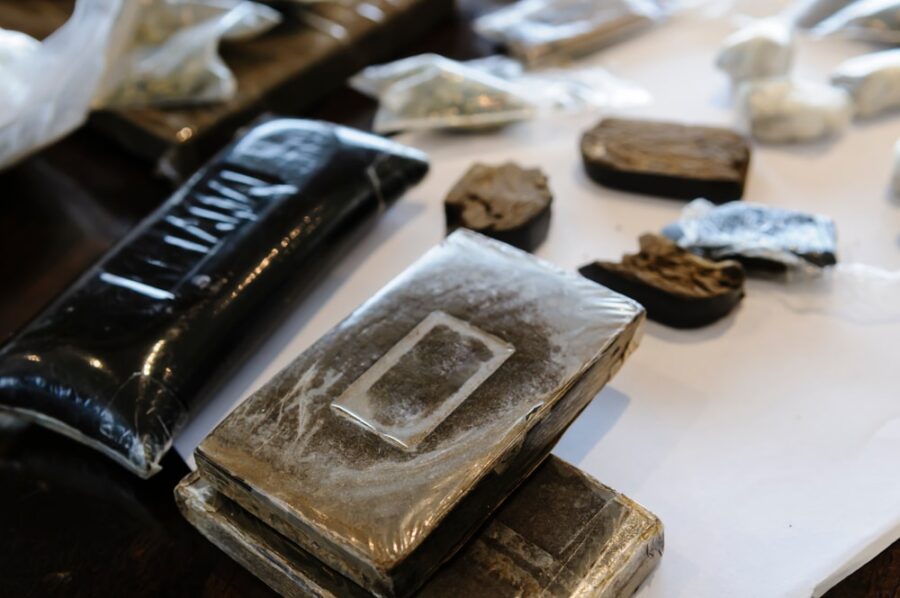 Several lumps of brick hash lying on a wooden table