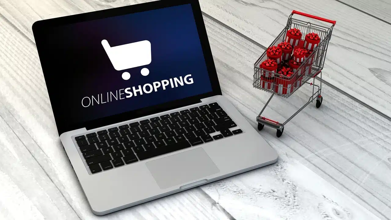 A laptop displaying a shopping cart symbolizes the convenience of finding the best place to buy marijuana seeds online.